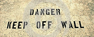 Danger keep off wall
