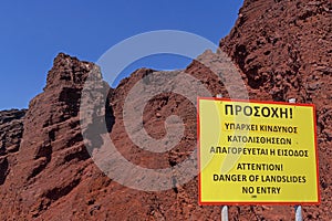 Danger of landslides board on Red Beach