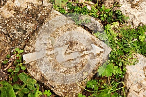 Danger lightning sign on the old stone brick on the road