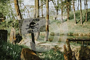 Danger Minefield with warning message board