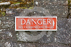 Danger, no climbing on walls