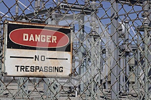 DANGER - NO TRESPASSING sign at an electrical substation