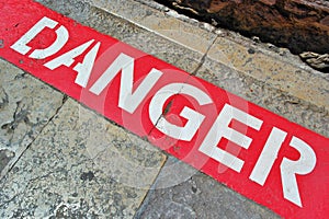 Danger, Perigo sign, red and white sign, stone background