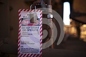 Danger permit isolation tag do not start or operate and locking to control life plant starting up