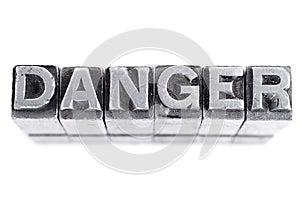 Danger sign, antique metal letter type photo