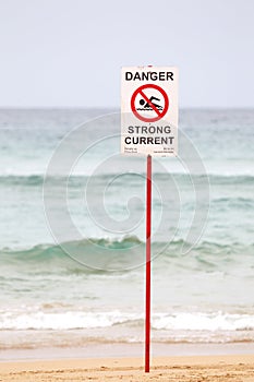 Danger Sign on the Beach