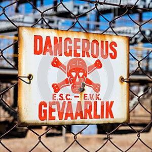 Danger Sign on a fence