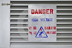 Danger sign in four languages