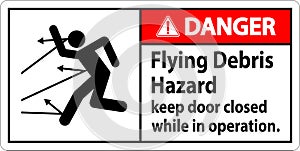 Danger sign indicating the risk of flying debris, advising to keep the door closed