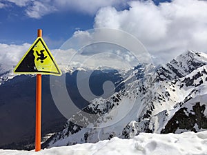 Danger sign at the peak of mountain at Sochi skiing resort in Ru