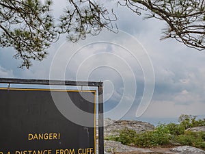 Danger sign on Phu Kradueng mountain national park in Loei City Thailand.