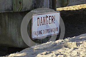 Danger sign at St Augustine Beach pier, Florida