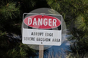 Danger Sign Warning of Erosion and an Abrupt Edge