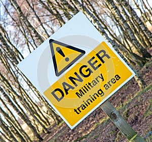 A danger sign warning of a military training area