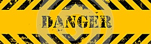 Danger sign on yellow background.warning sign with black stripes on yellow background.