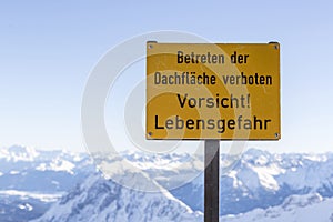 Danger sign at Zugspitze mountain, Bavaria, Germany