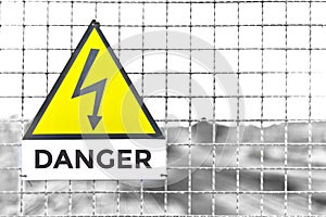 Danger Text Triangle Yellow Metal sign train deposit in photo