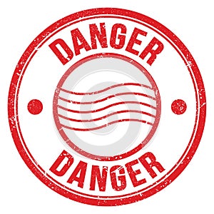 DANGER text written on red round postal stamp sign