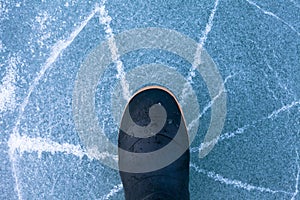 Danger thin ice radially cracks under rubber boot