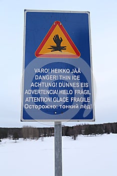 ` Danger! Thin Ice` sign on different languages