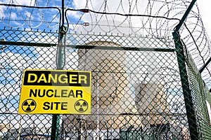 Danger warning sign on the security fence of a nuclear power station