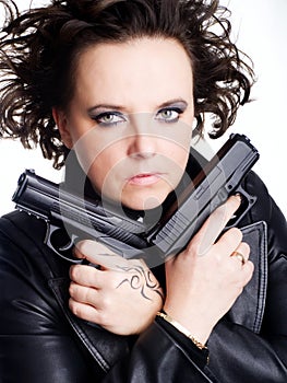 Danger woman holding two guns