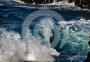 Dangerious ocean stormy waves hits black lava rocks on La Palma island, Canary, Spain