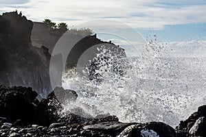 Dangerious ocean stormy waves hits black lava rocks on La Palma island, Canary, Spain