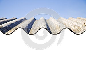 Dangerous asbestos roof - one of the most dangerous materials in buildings so-called ‘hidden killer’ - image with copy space