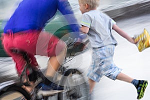 Dangerous bicycle traffic situation on the road. Intentional motion blur