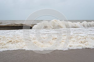 Dangerous and big waves at pantai cinta berahi beach in kota bharu, kelantan, malaysia photo