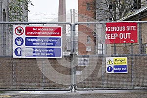 Dangerous building construction site keep out health and safety signs