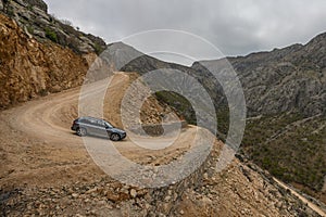 Dangerous curves crossing a dirt track that crosses