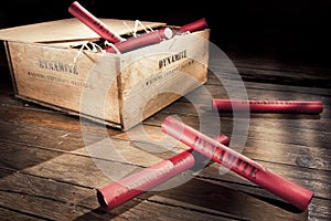 Dangerous dynamite sticks on wooden a box