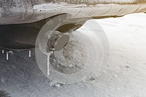 Dangerous freezing of the exhaust pipe of the car in extreme cold during long parking and heating of the passenger compartment