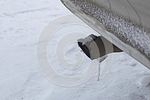 dangerous freezing of the exhaust pipe of the car in extreme cold during long parking and heating of the passenger compartment