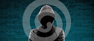 Dangerous hacker over abstract digital background with binary code. Obscured dark face in mask and hood. Data thief
