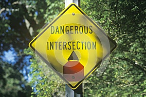 Dangerous intersection road sign photo