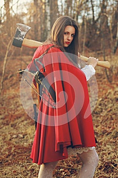Dangerous Little red riding hood with axe