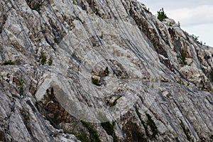 Dangerous mountains are wrapped in a net to protect against rockfall