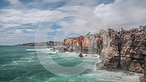 Dangerous ocean waves crash into cliff, Devil Mouth Boca do Inferno, Portugal