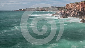 Dangerous ocean waves crash into cliff, Devil Mouth Boca do Inferno, Portugal