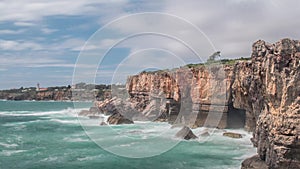 Dangerous ocean waves crash into cliff, Devil Mouth Boca do Inferno, Portugal