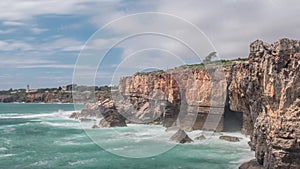 Dangerous ocean waves crash into cliff, Devil Mouth Boca do Inferno, Portugal