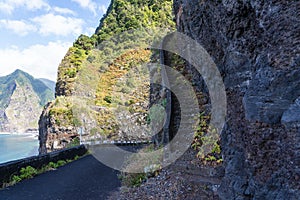 Dangerous part of the old road with rockfall