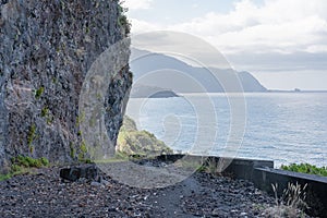 Dangerous part of the old road with rockfall