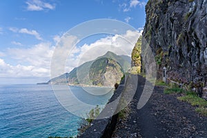 Dangerous part of the old road with rockfall