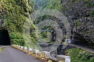 Dangerous part of the old road with rockfall