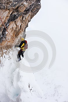 Dangerous pitch during an extreme winter climbing