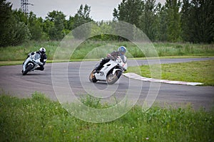 Dangerous race between two motorcycle athletes